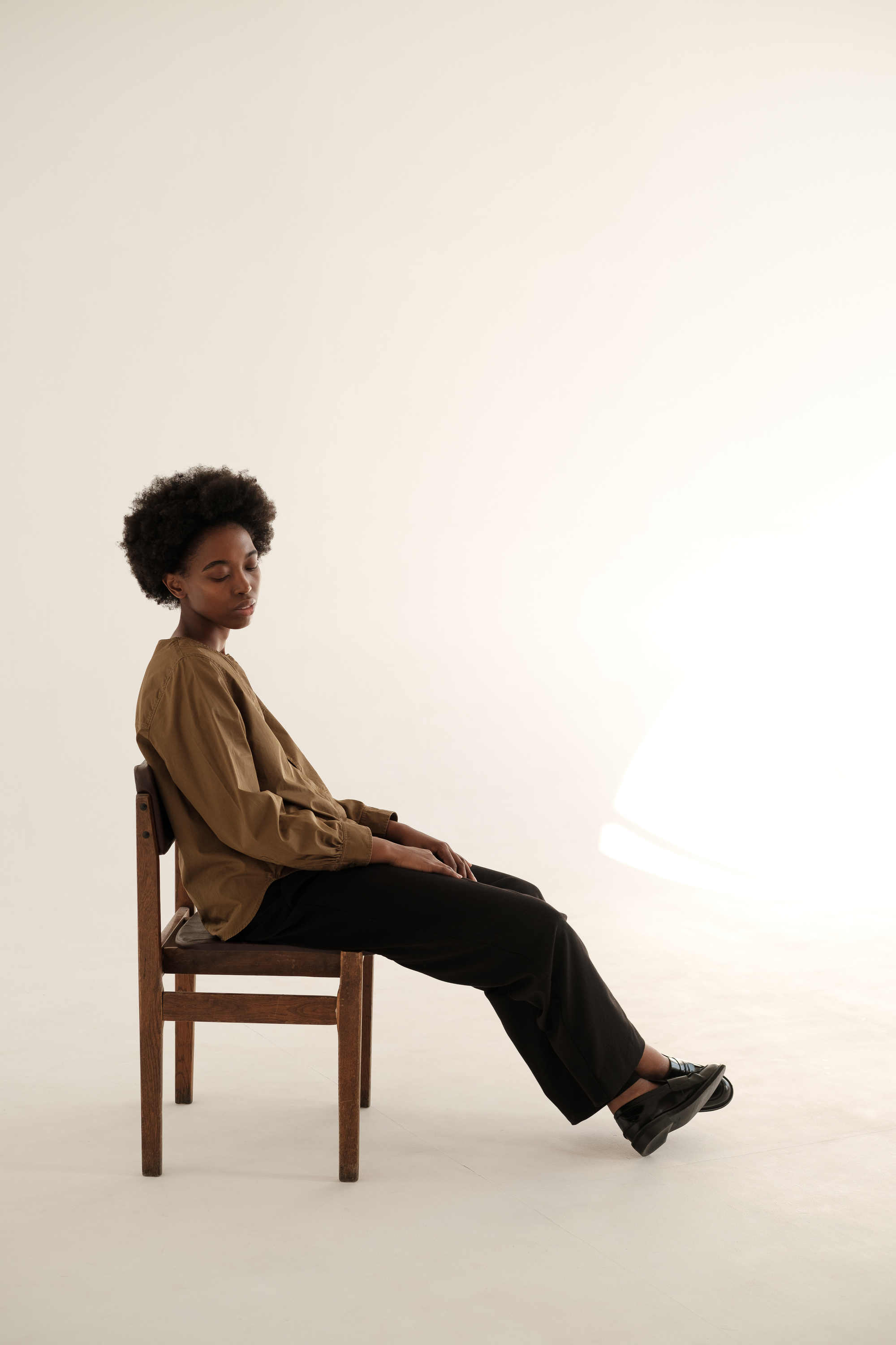 Woman in Casual Brown Dress Shirt and Slacks
