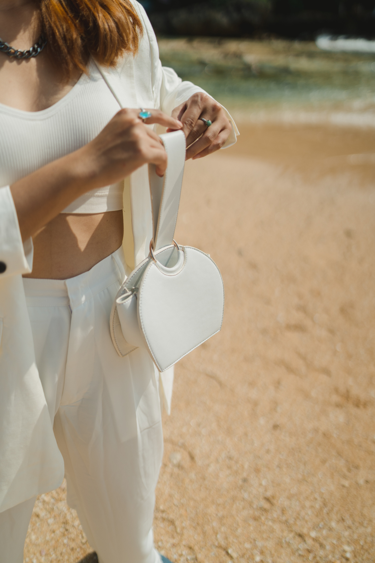 Woman Posing with White Vegan Leather Bag Outdoors