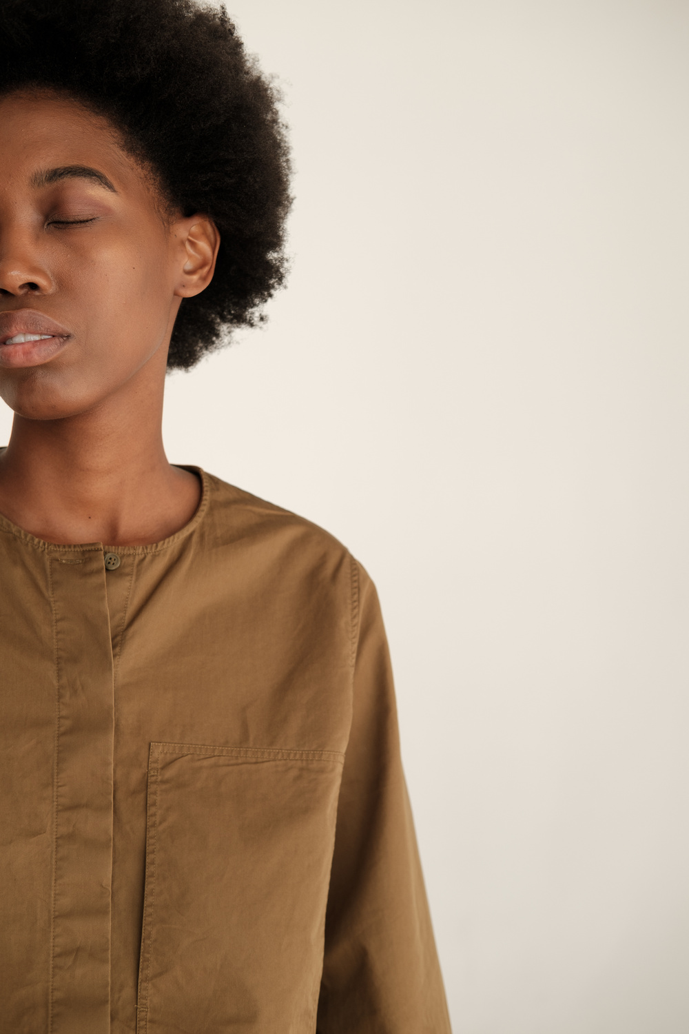 Woman in Casual Brown Dress Shirt