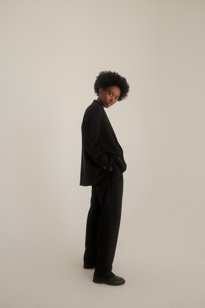 Woman in Black Blazer and Slacks